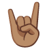 sign of the horns: medium skin tone on Google