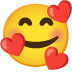 smiling face with hearts on Google
