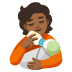 person feeding baby: medium-dark skin tone on Google