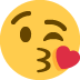 face blowing a kiss on Twitter/X